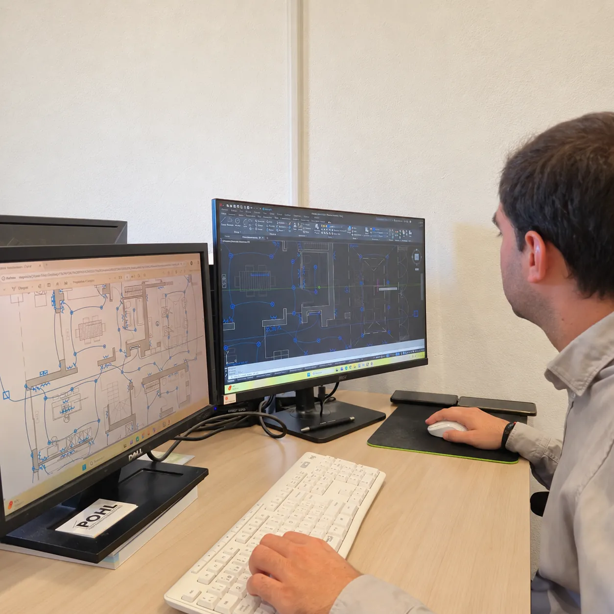 Technical planner creating detailed CAD drawings